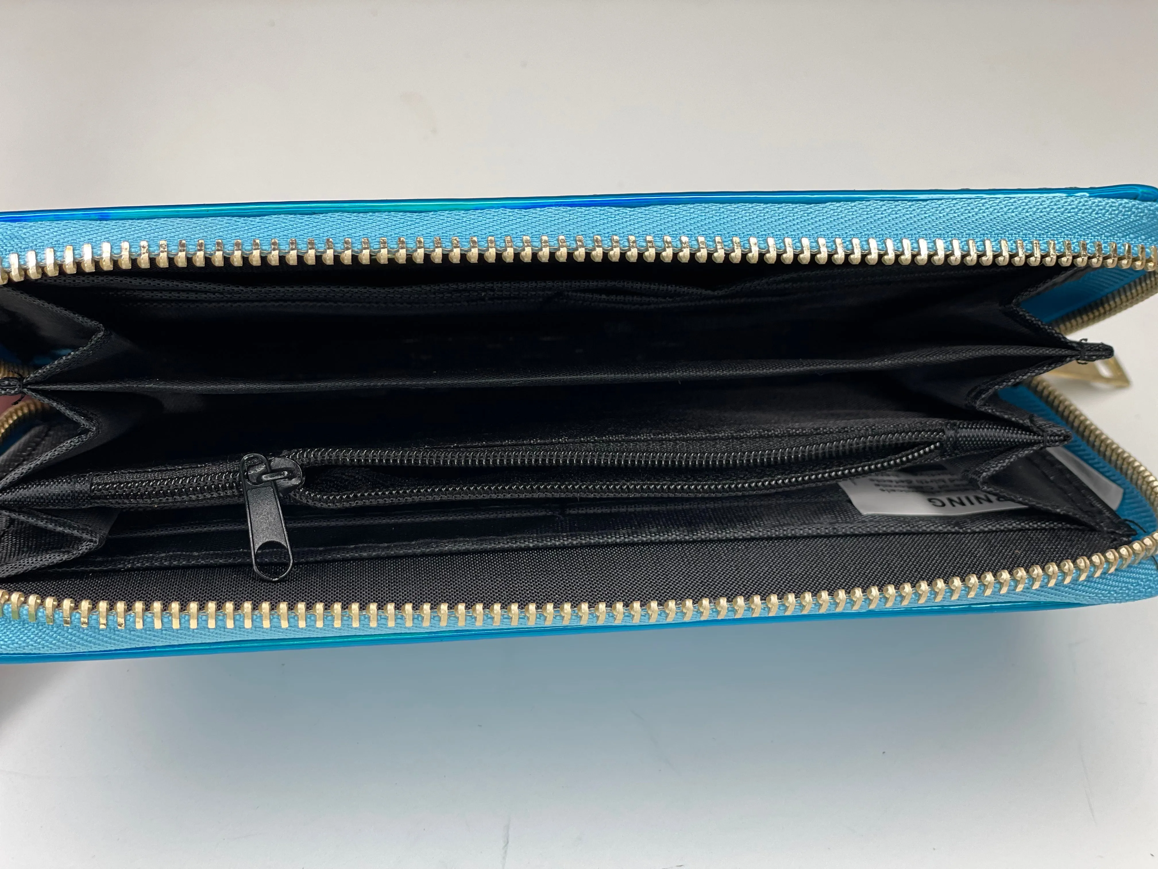 Single Wallet in Light Blue tropical wallet (black patch, gold hardware)